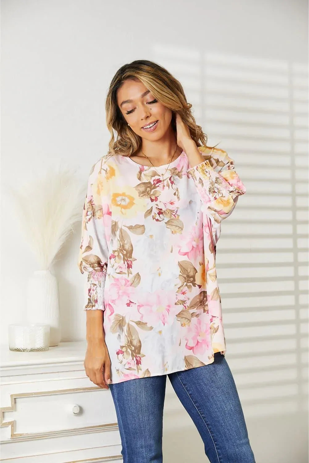 Floral Top features a classic round neck and three-quarter sleeves - Billien