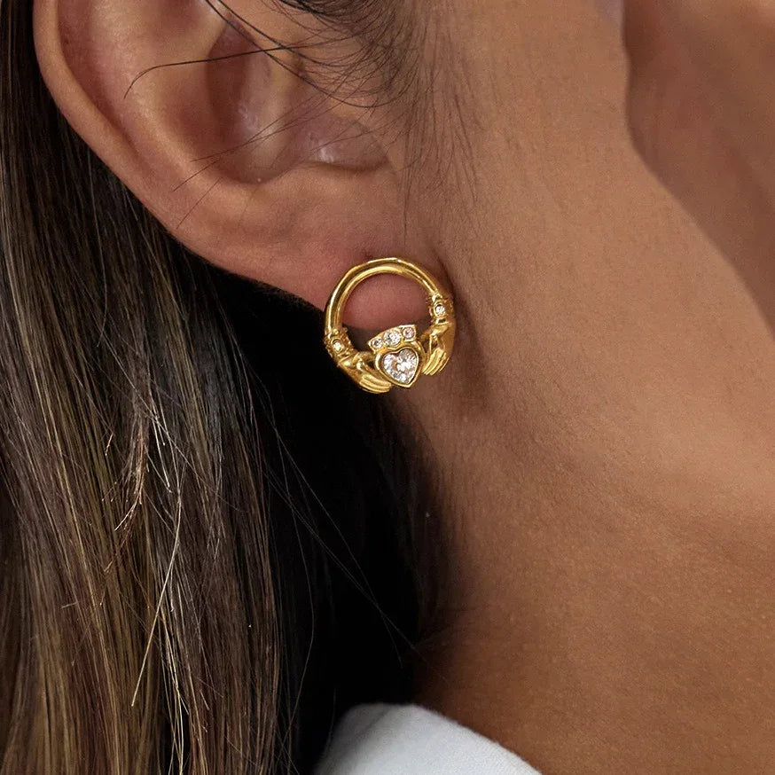 18K gold-plated friendship hand design titanium steel stud earrings with cubic zirconia. - Billien