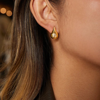 18K gold earrings inlaid with cubic zirconia in a teardrop design. - Billien